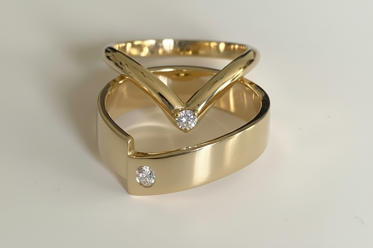 Pair of V shape wedding bands with accent stone