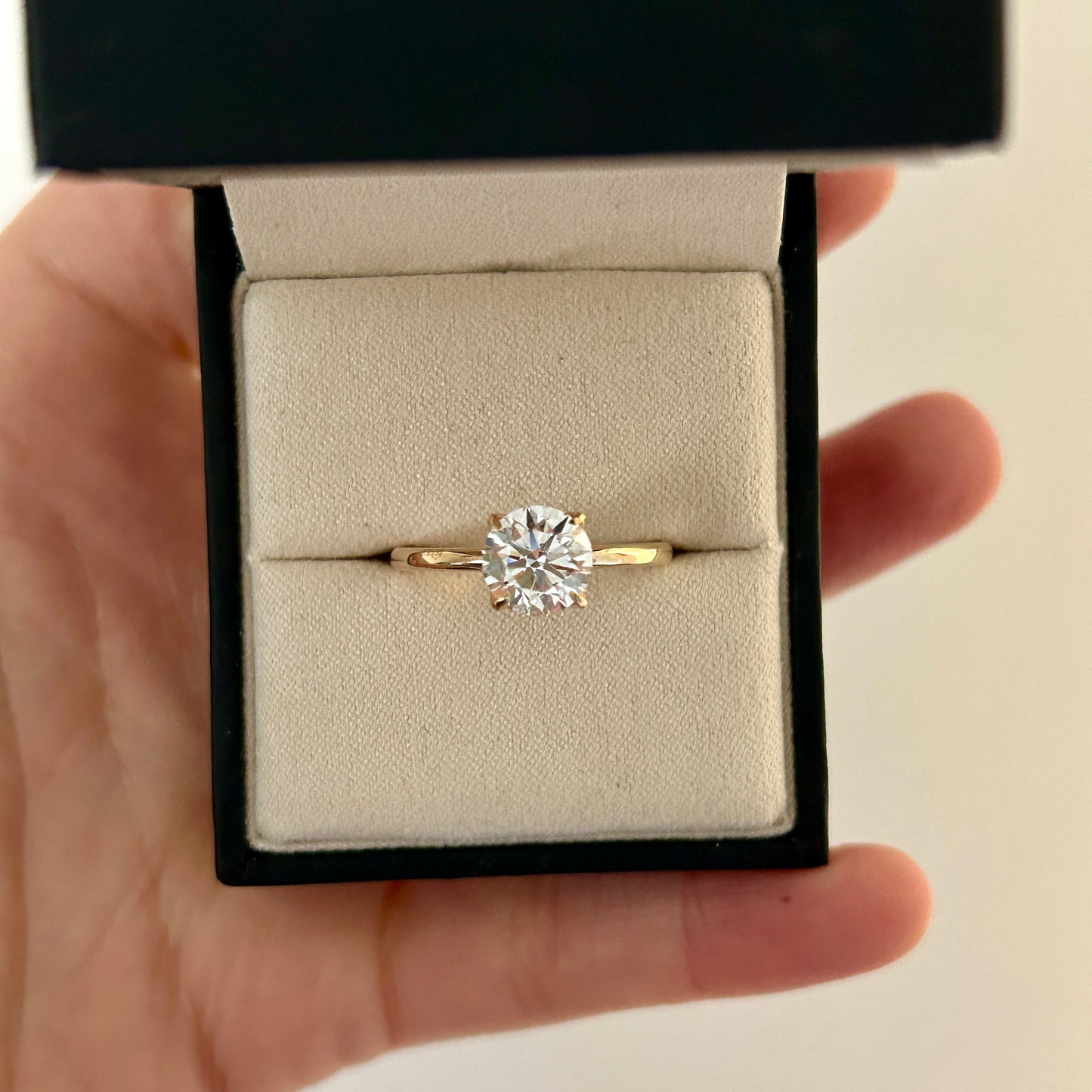 Tulip diamond solitaire engagement ring