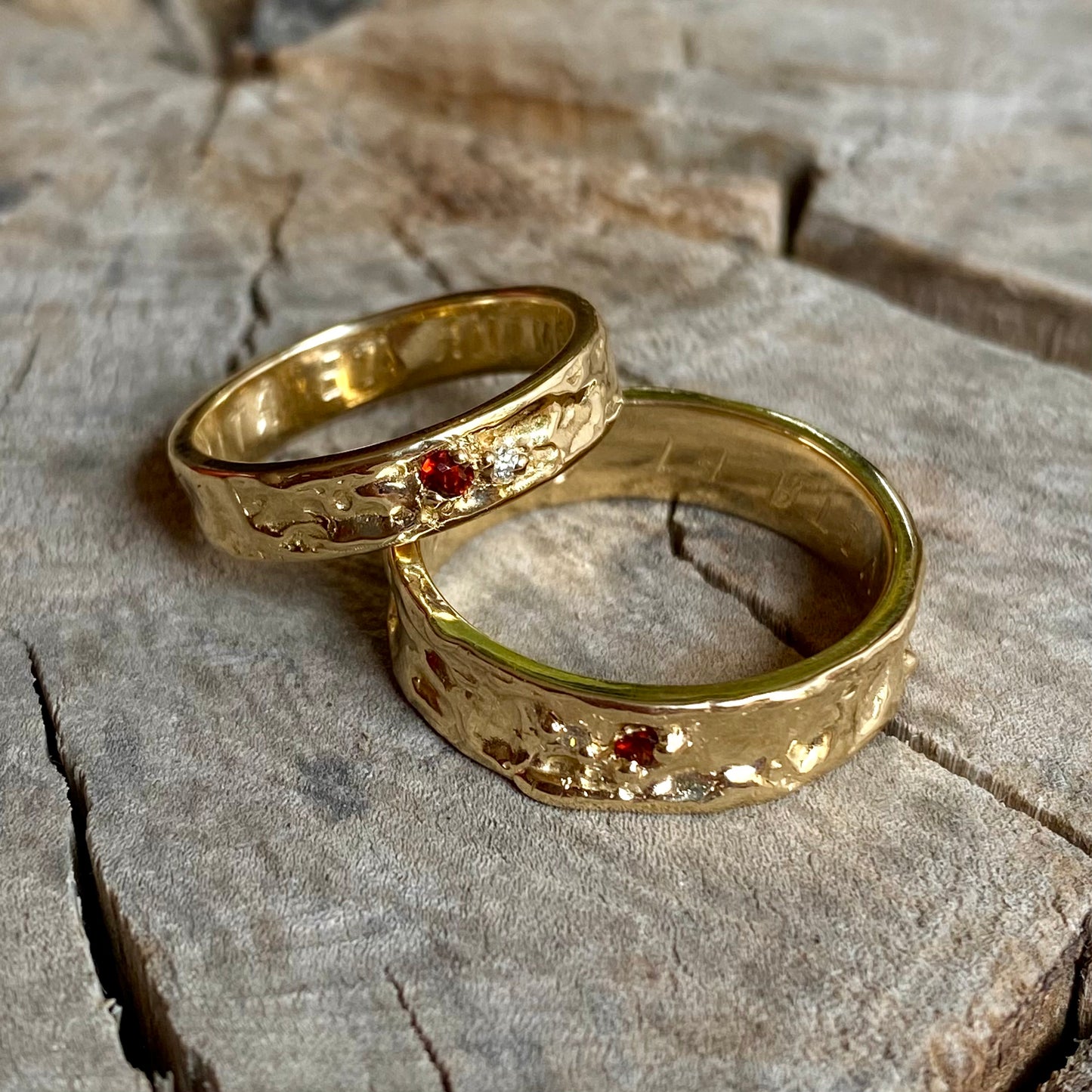 Pair of organic wedding bands with two gemstones