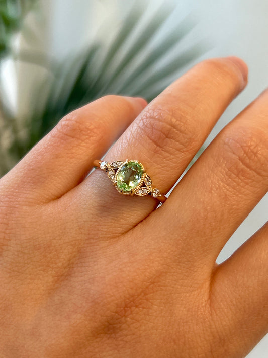 Antoinette pistacho oval sapphire vintage engamenent ring