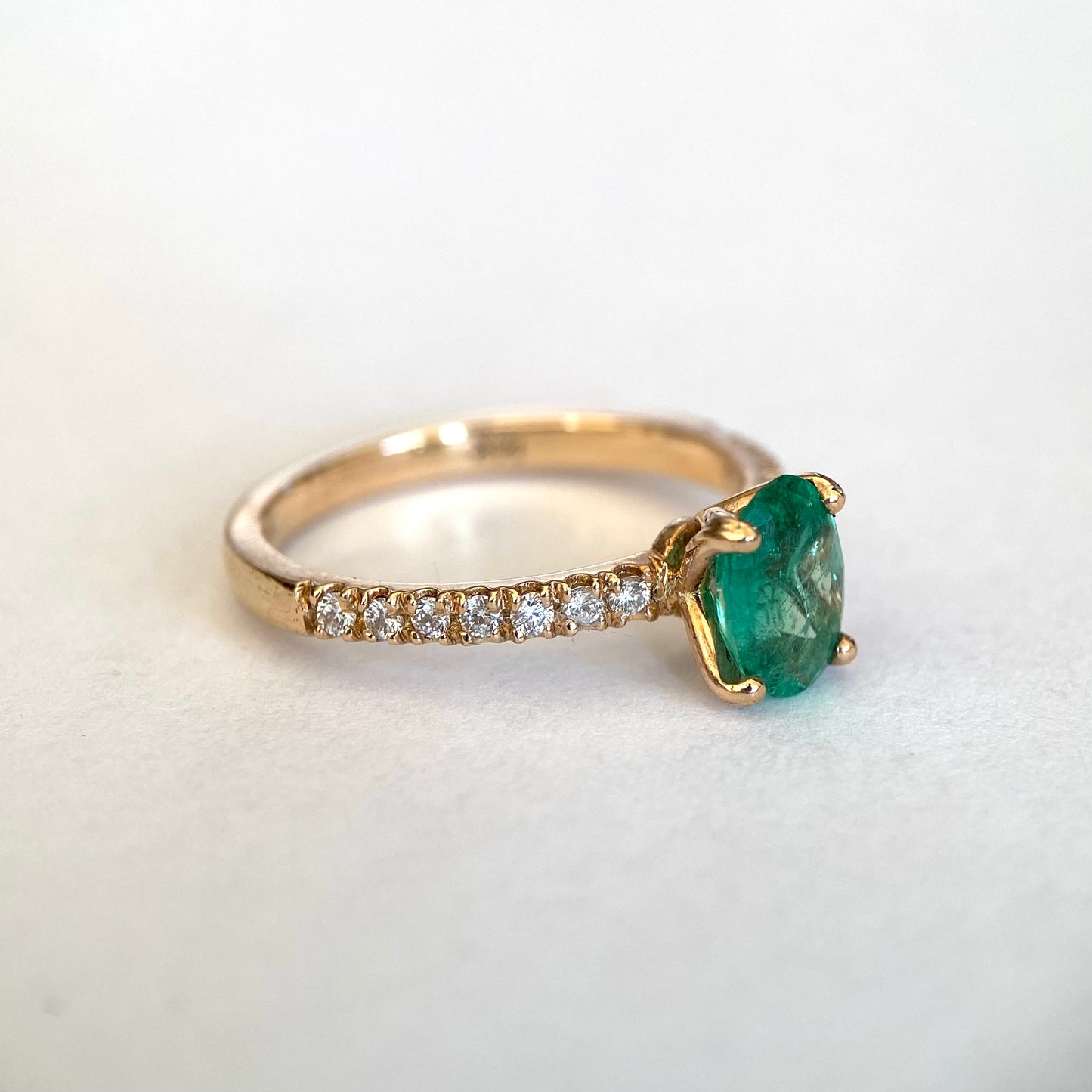 Oval cut emerald engagement ring