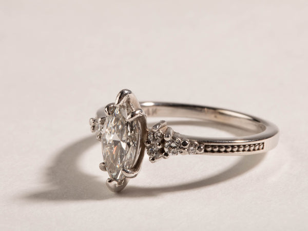 Vintage inspired celestia marquise cut diamond engagement ring 