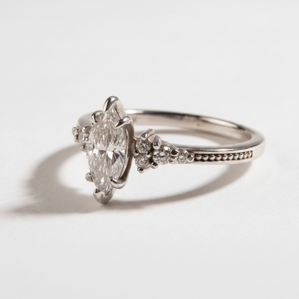 Vintage inspired celestia marquise cut diamond engagement ring 