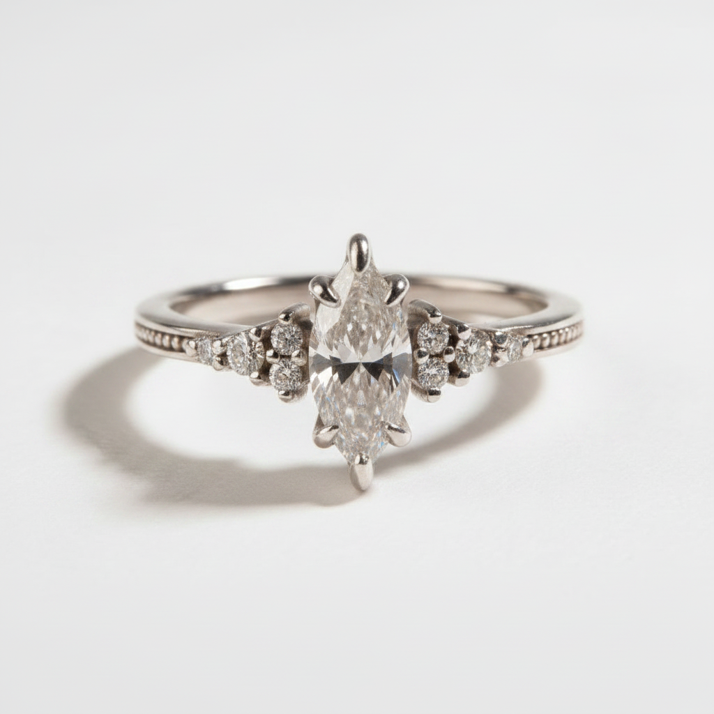 Vintage inspired Celestia marquise cut diamond engagement ring in 14K gold | Retorica