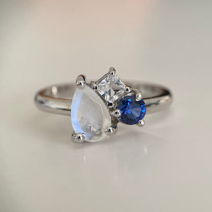 Moonstone and sapphires family ring