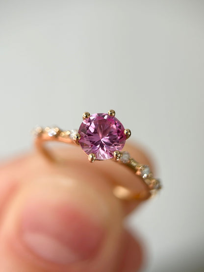 Six prongs round cut lab grown pink sapphire ring in 14K yellow gold