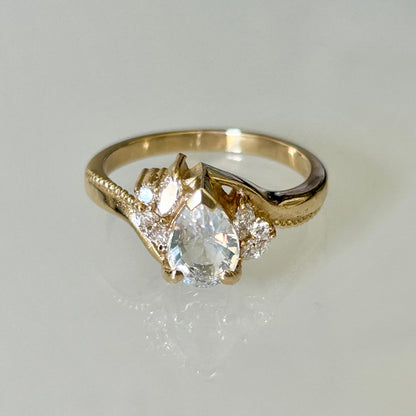 Natural pear cut rainbow moonstone and diamonds engagement ring