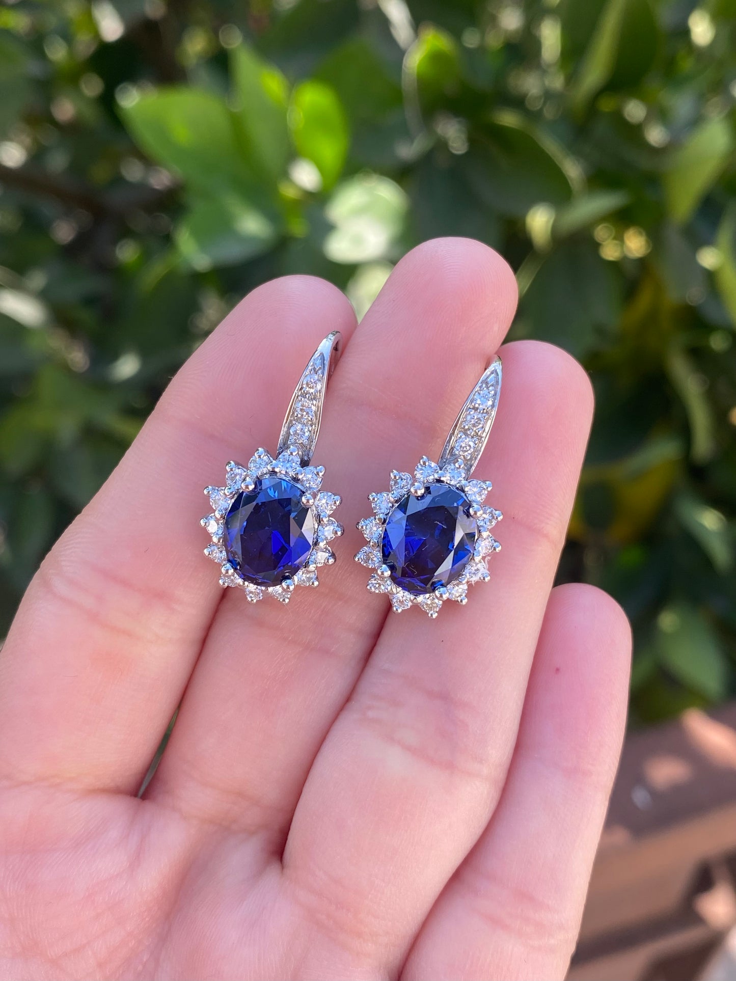 Oval halo sapphire and diamonds  earrings