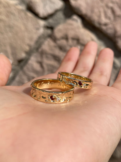 Pair of organic wedding bands with two gemstones