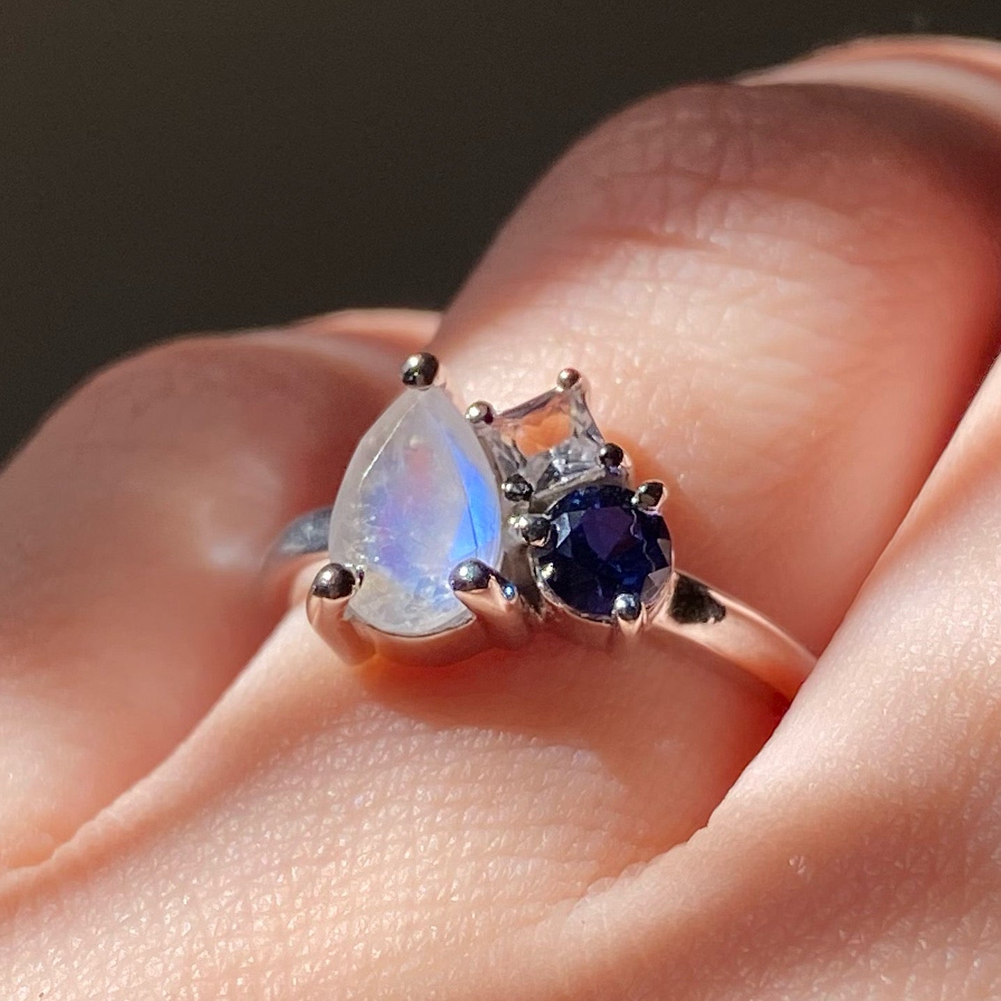 Moonstone and sapphires family ring