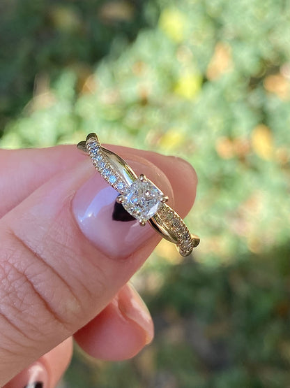 Twisted cushion cut diamond engagement ring