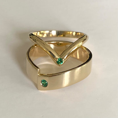 Pair of V shape wedding bands with accent stone