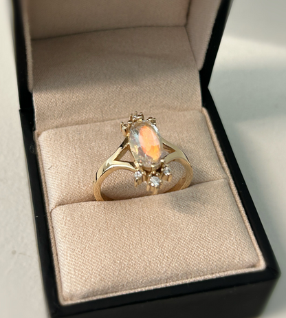 Oval cut rainbow Moonstone and diamonds burst ring in 14K yellow gold
