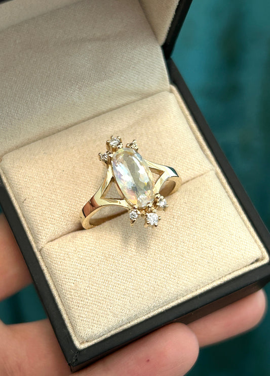 Oval cut rainbow Moonstone and diamonds burst ring in 14K yellow gold