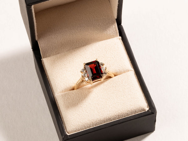 Emerald cut Mozambique garnet and diamonds ring