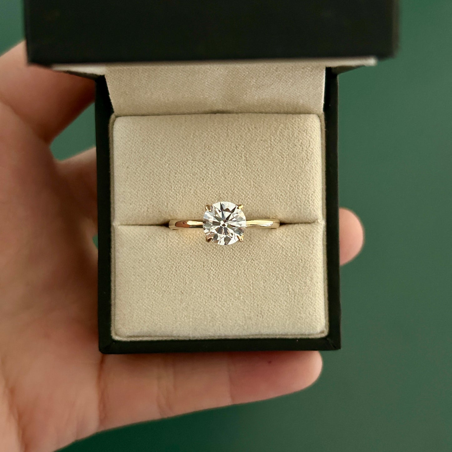 Tulip diamond solitaire engagement ring