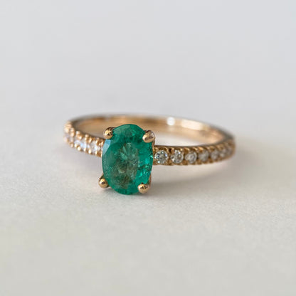 Oval cut emerald engagement ring