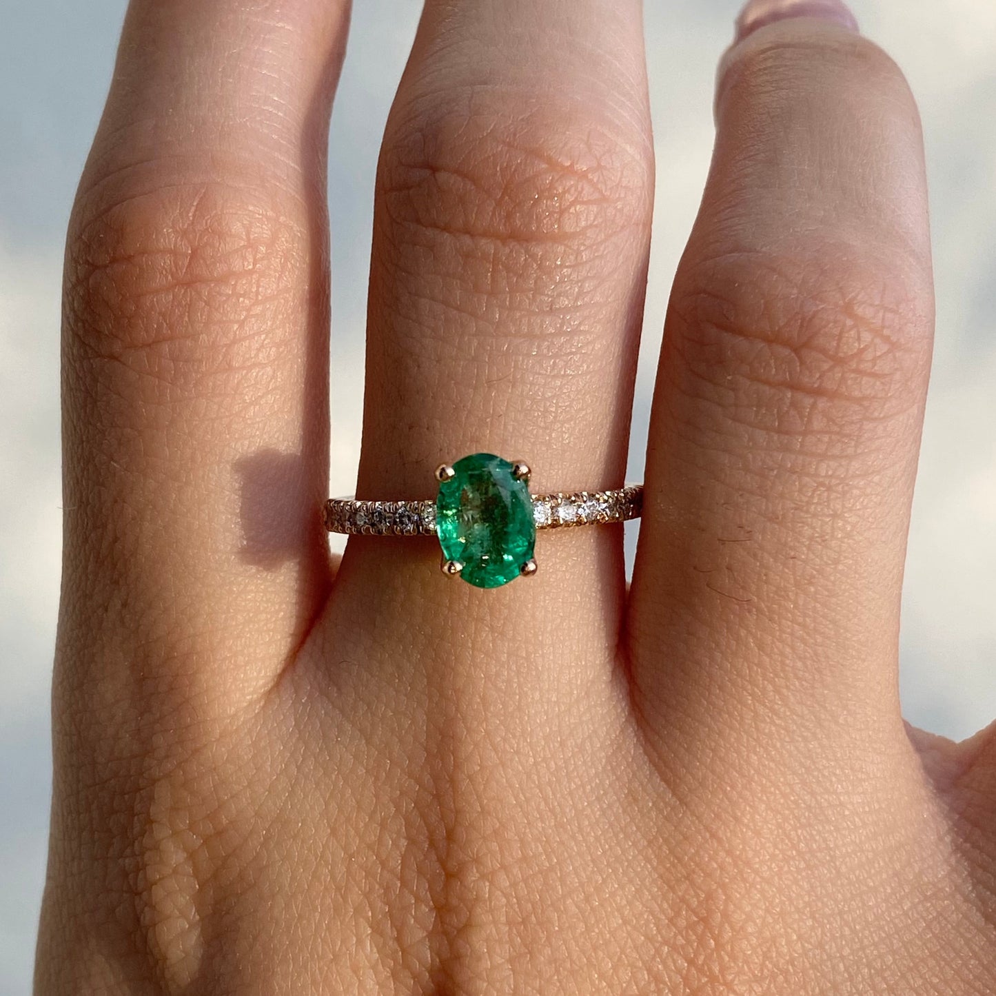 Oval cut emerald engagement ring