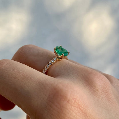 Oval cut emerald engagement ring