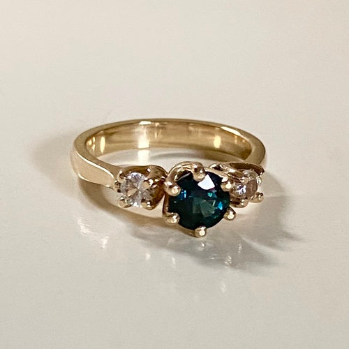 Teal sapphire engagement ring