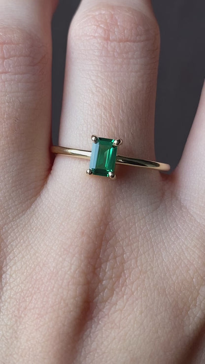 Petite emerald solitaire ring