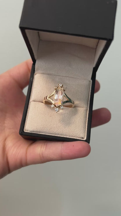 Oval cut rainbow Moonstone and diamonds burst ring in 14K yellow gold