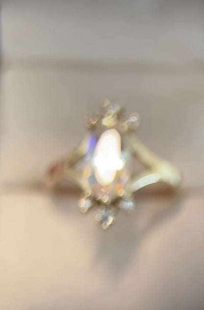 Oval cut rainbow Moonstone and diamonds burst ring in 14K yellow gold