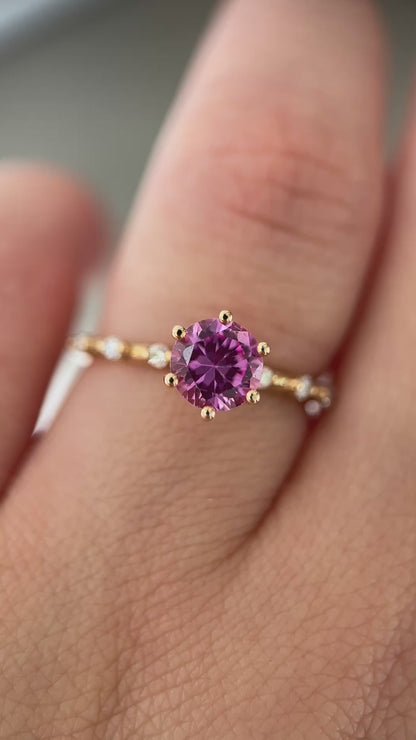 Six prongs round cut lab grown pink sapphire ring in 14K yellow gold